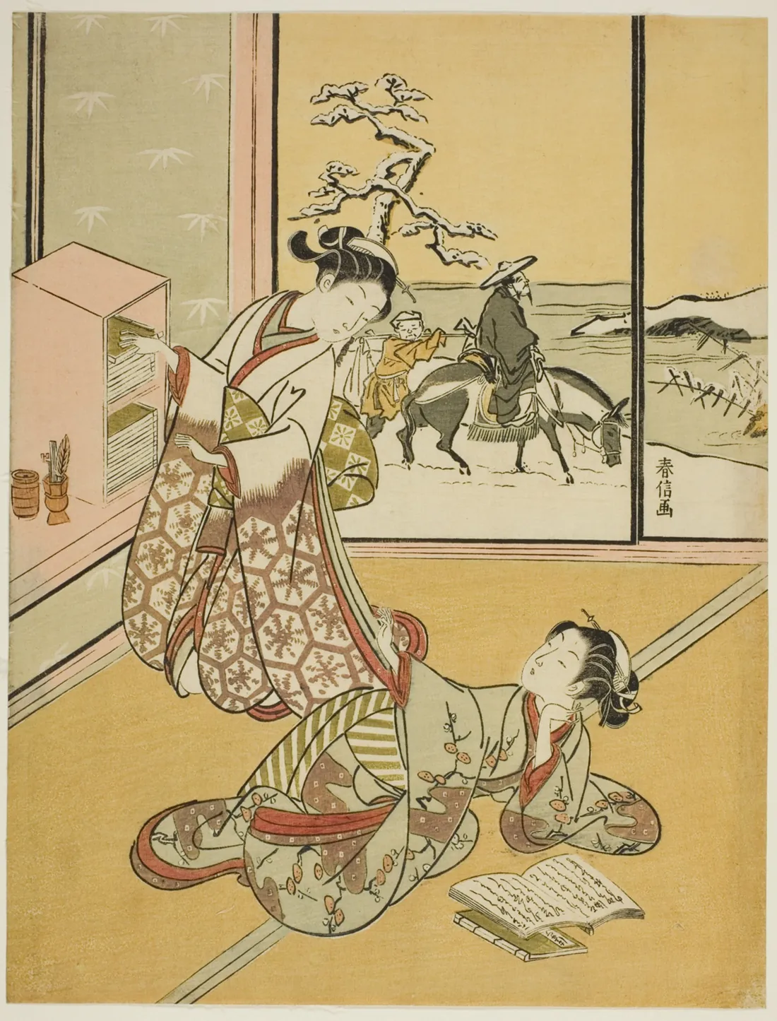 Woodblock print of two young women in a room, one standing with a book, the other lying on the floor reading